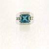 Witgouden occasion ring met diamant en een buff-top London Blue Topaas #22607