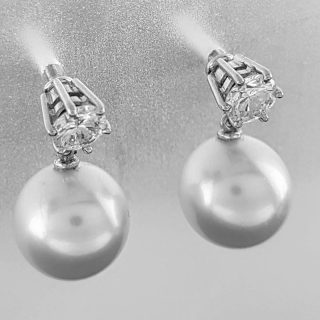 14 Karaat witgouden briljant geslepen diamant 2-0.54 crt. met losse parelhanger #23313