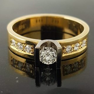 14 karaat bicolor gouden ring met u-zetting en diamant #21987