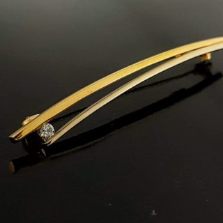 Gouden broche bicolor met diamant. Tweedehands #21511