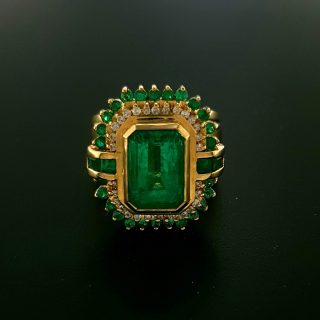 18 karaat gouden occasion ring met smaragd en diamantjes #23370