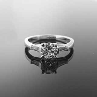 14 Karaat witgouden ring met een diamant van 0.83 crt. #20460