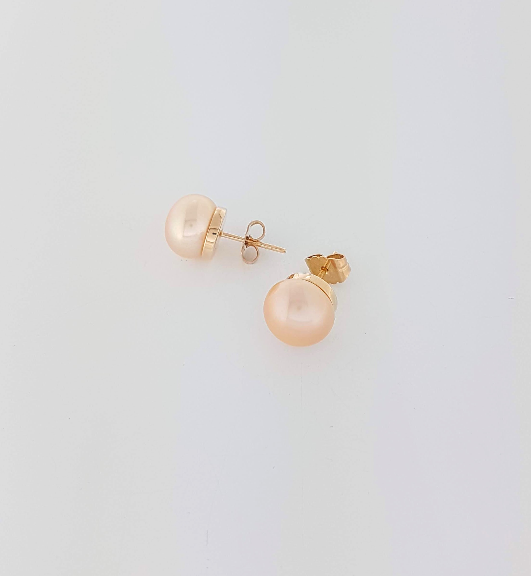 parel oorknoppen met 14 karaat rosé goud #23872 | Goudsmederij/Juwelier Arnold van