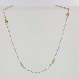 Witgouden collier met 9-0.45 crt diamant #24340