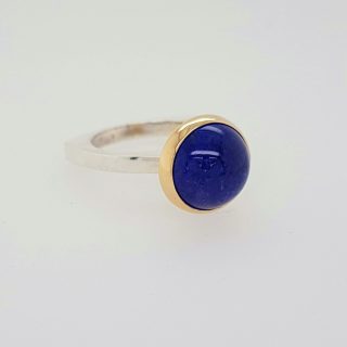 Zilveren ring met gouden zetting en Tanzaniet. Uniek product. #24403