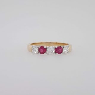 Gouden ring met diamant en robijn. #23505