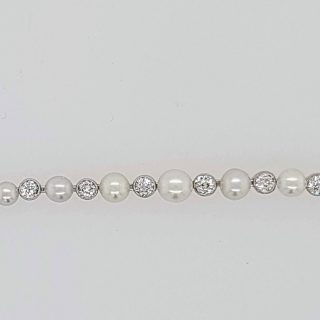 Witgouden vintage armbandje met pareltjes en briljant / diamant #18384