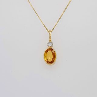 Gouden hanger met gele saffier en een diamantje #21467