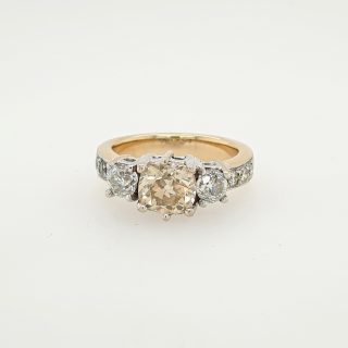 14 Karaat wit- met geelgouden ring met champagne kleurige diamant. Occasion. #25080