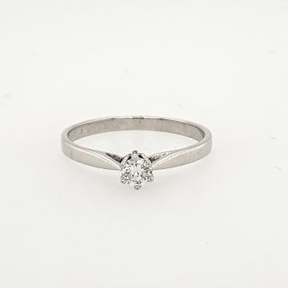 Witgouden Solitairring met briljant 1-0.13 crt W.VS. 14 karaat eigen werk. # 25502