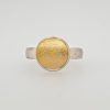 Zilver met gouden ring met een briljantje van MANU. # 25728