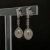 14 Karaat witgouden oorhangers met zoetwaterparels en diamant.# 25735 - Afbeelding 4