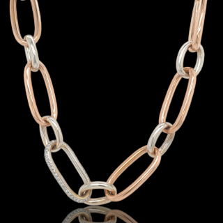 18 karaat rosé- en witgouden schakelcollier met diamant. #27921Tweedehands.