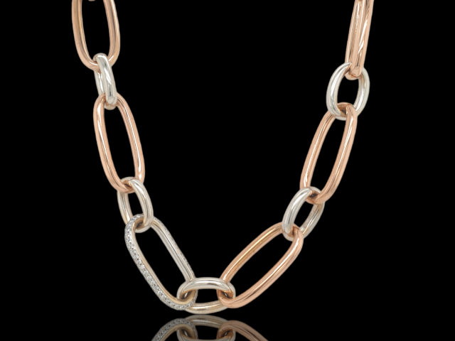 18 karaat rosé- en witgouden schakelcollier met diamant. #27921Tweedehands.