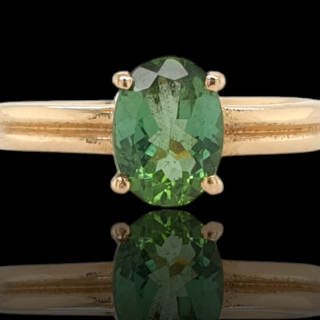 14 Karaat gouden ring met een groene toermalijn in een 4 poots chaton. #27958