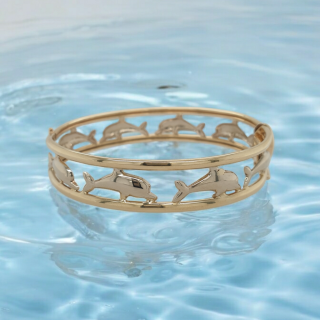 Gouden armband met dolfijnen. 2e hands, # 28129