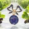 Blauw emaille broche met medaillon. 14 karaat geelgoud. #28161