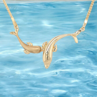 2 Dolfijnen ketting van 14 karaat geelgoud. 2e hands. #28332
