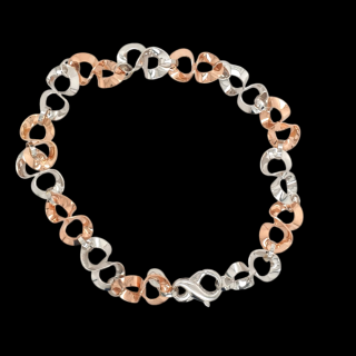 14 Karaat rood- en witgouden armband, 2e hands. #28347