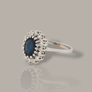 Witgouden ring met blauwe saffier en diamant - Occasion #28770