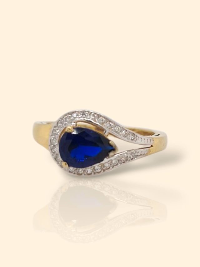 Geelgouden ring met blauwe en witte zirkonia occasion #28787