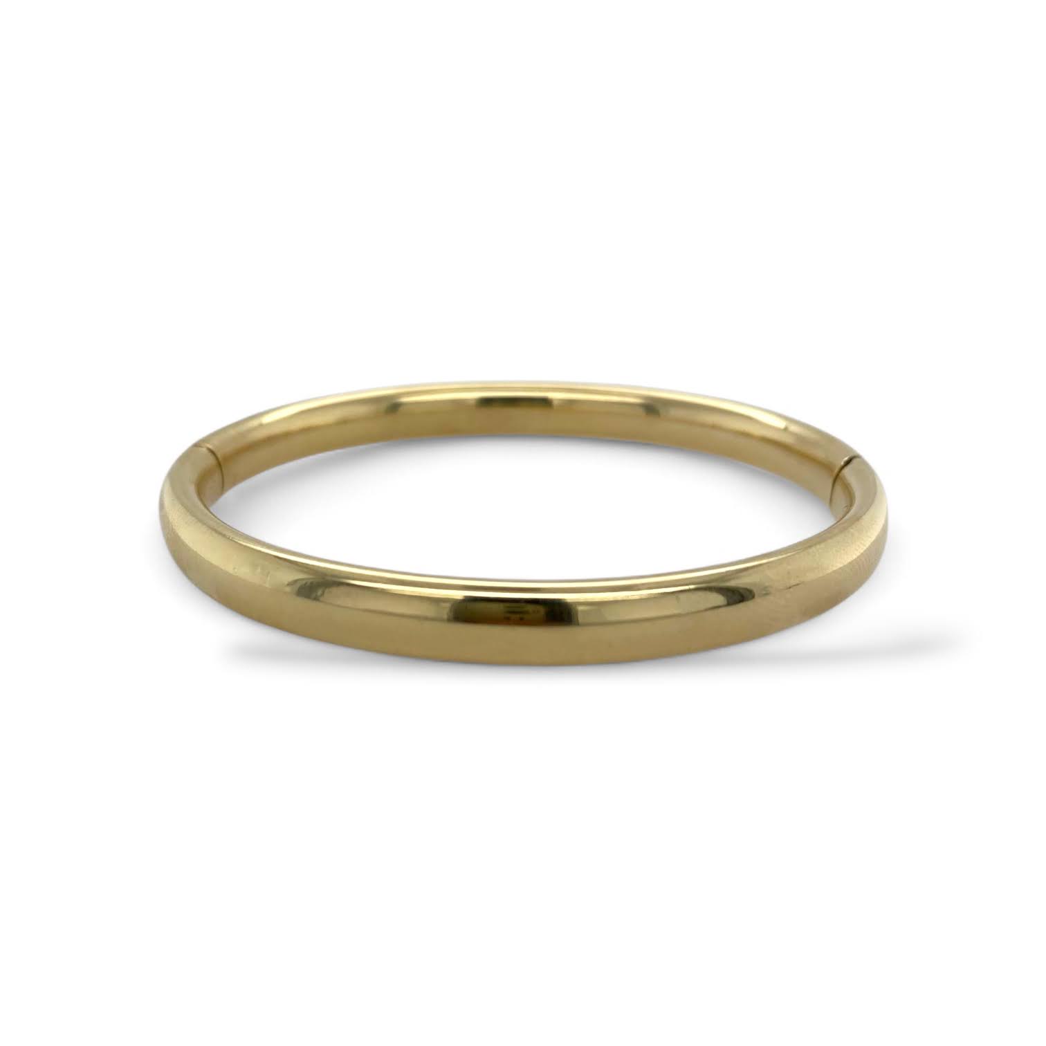 Handgemaakte gouden tuimelring met beweeglijke zetting en edelsteen