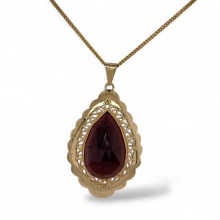 14 karaat geelgouden hanger in druppelvorm met granaat edelsteen