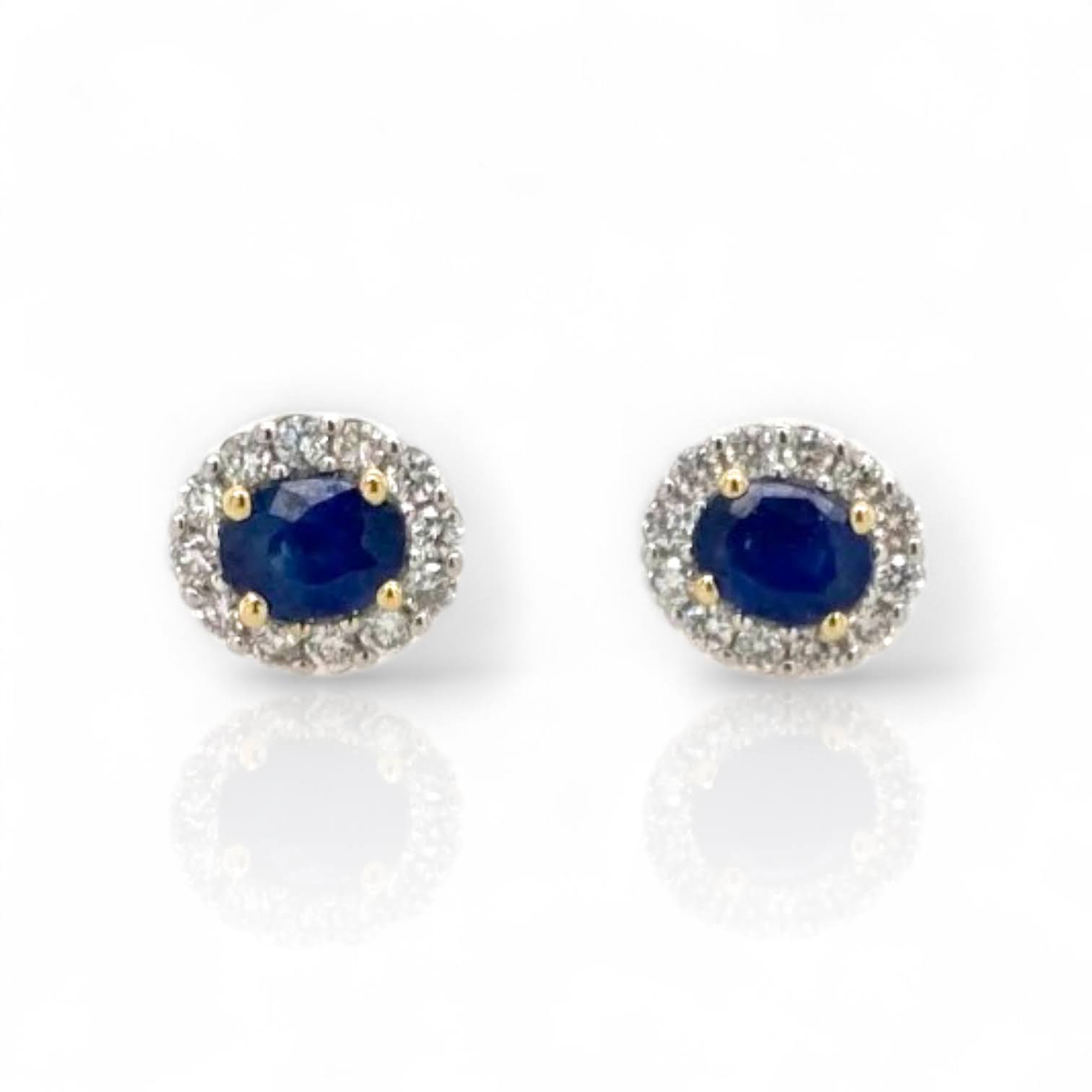 18 karaat gouden oorknopjes met blauwe saffier en diamant entourage vintage