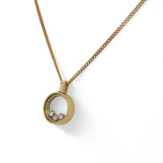 14 karaat gouden hanger met drie bewegende diamanten in glazen zetting