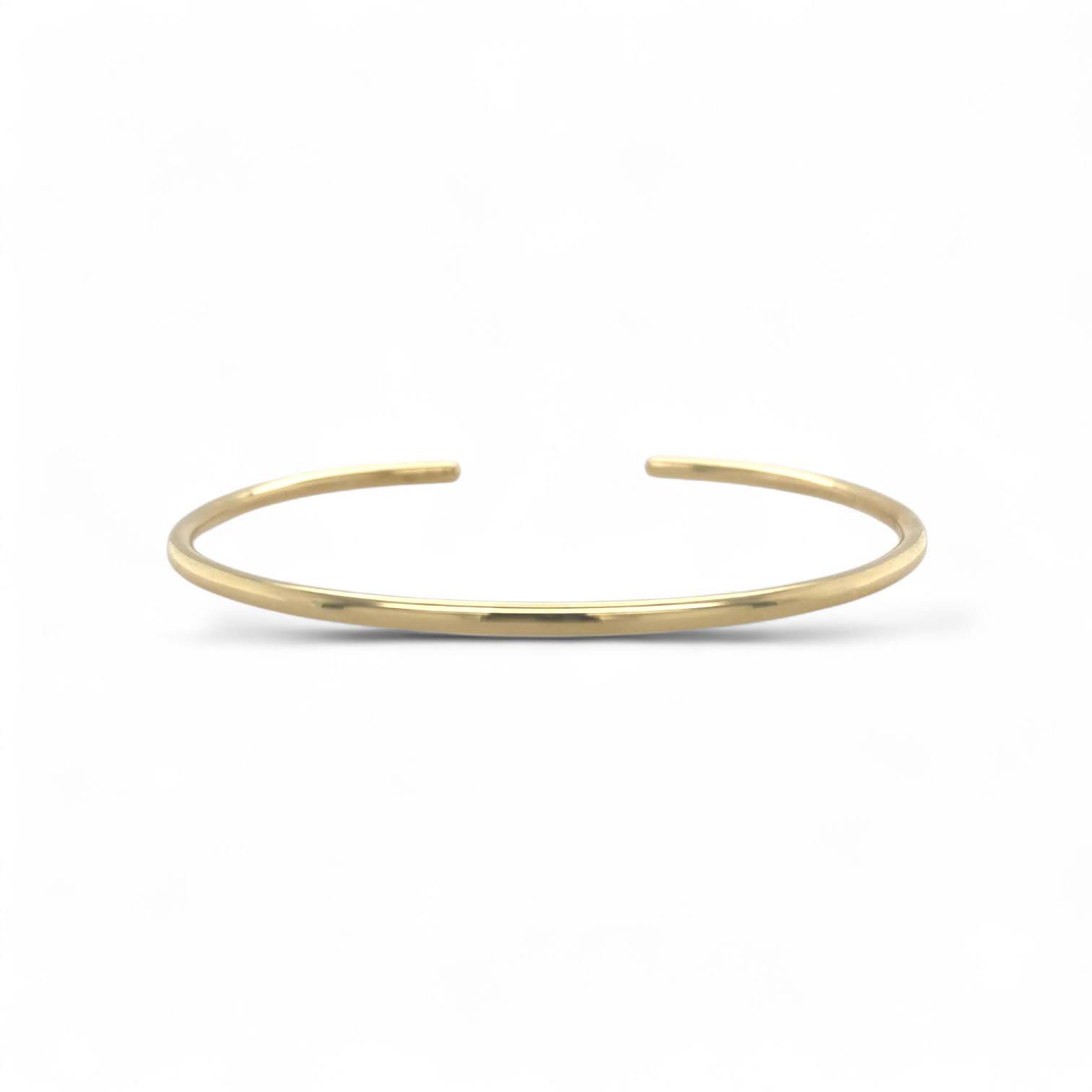 Gouden spang armband bangle van 14k goud handgemaakt in eigen atelier met minimalistisch design