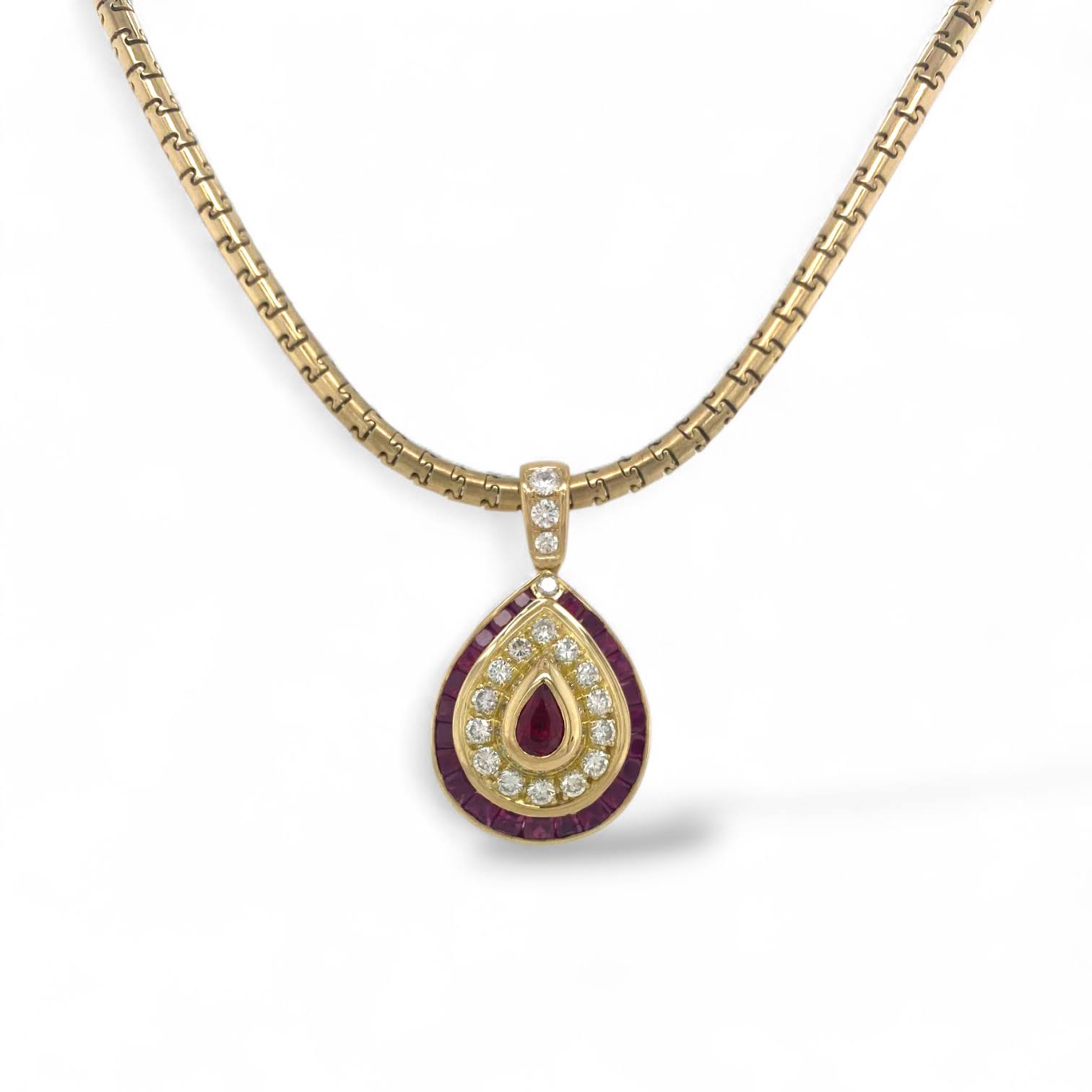 Robijn en diamanten druppel hanger in 18 karaat goud aan puzzel collier vintage