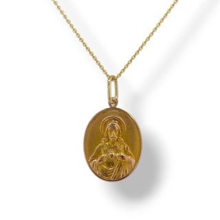 Gouden ovale religieuze medaille met Maria en kindje Jezus en Jezus Christus met Heilig Hart