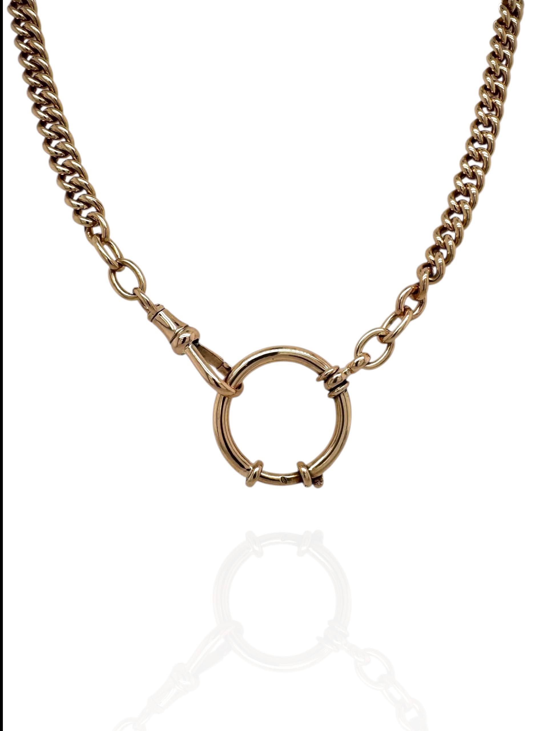 14 karaat gouden wikkelhanger met drie diamanten aan zwart nylon collier