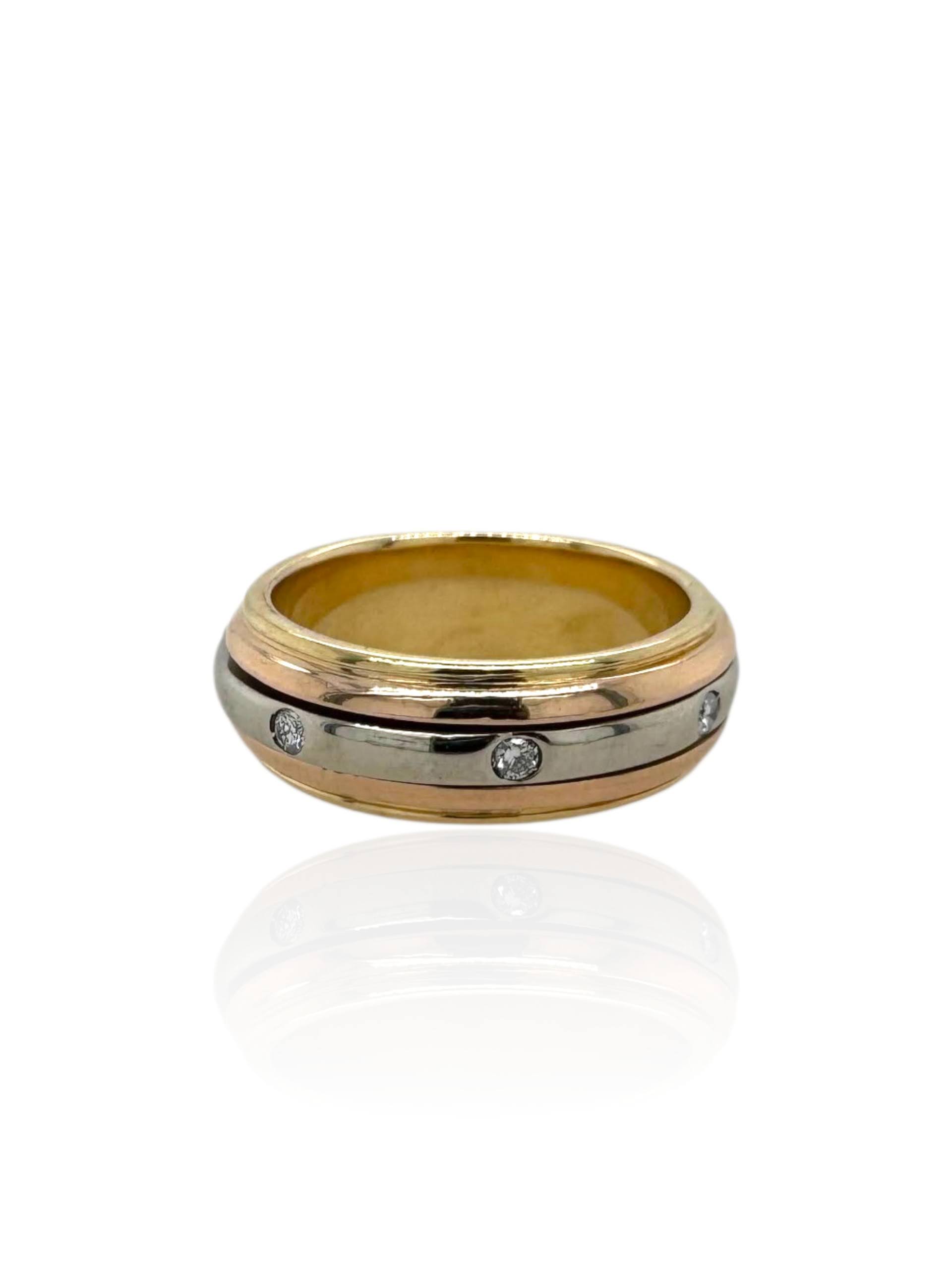 18 karaat gouden spinner ring in drie kleuren goud met acht diamantjes in de witgouden middenband.